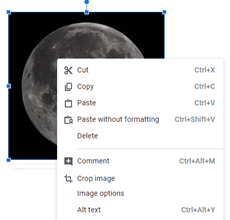 Photo of the Earth's moon with Google Docs context menu in foreground